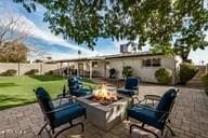 view of patio / terrace featuring a fire pit