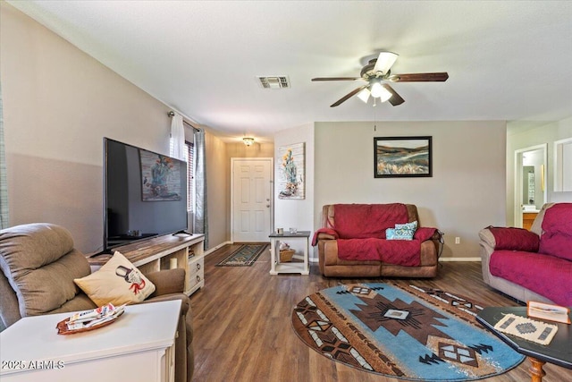 1057 E Silversmith Trl, San Tan Valley, AZ 85143 - living room featuring wood finished floors and ceiling fan