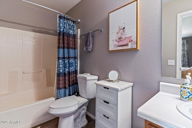 1057 E Silversmith Trl, San Tan Valley, AZ 85143 - bathroom featuring vanity, a textured wall, shower / tub combo with curtain, and wood finished floors