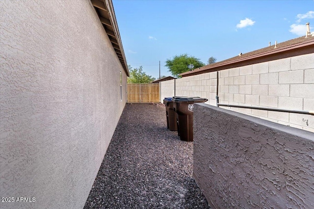 1057 E Silversmith Trl, San Tan Valley, AZ 85143 - view of side of property featuring stucco siding