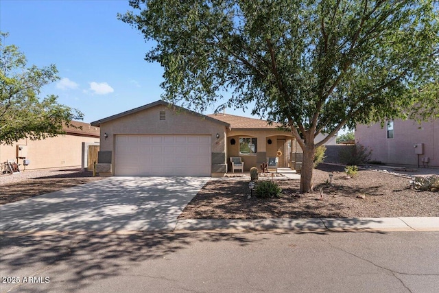 1057 E Silversmith Trl, San Tan Valley, AZ 85143 - view of front of house with an attached garage, stucco siding, and concrete driveway
