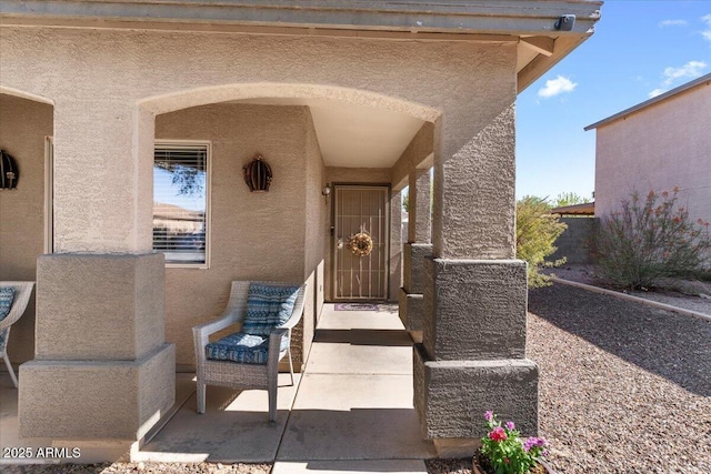 1057 E Silversmith Trl, San Tan Valley, AZ 85143 - entrance to property with stucco siding and a patio