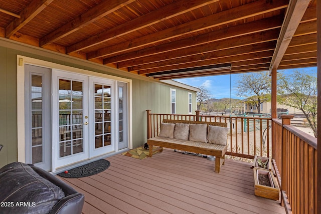 wooden terrace featuring french doors