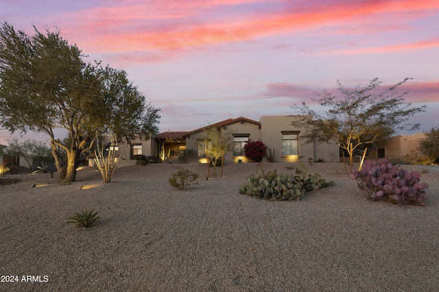 view of front of property featuring a patio area