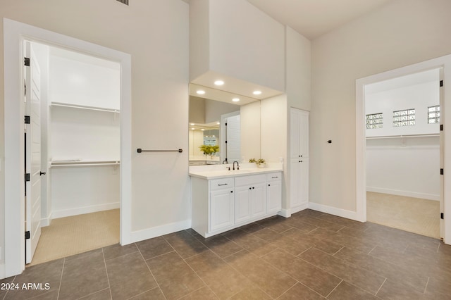 bathroom featuring vanity and tile patterned flooring