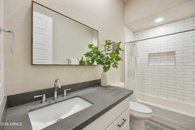 full bathroom featuring toilet, shower / bath combo, and vanity