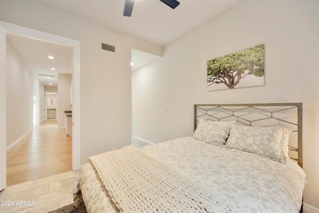 bedroom featuring ceiling fan and light wood-type flooring