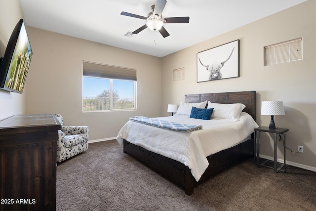 bedroom with visible vents, baseboards, carpet floors, and ceiling fan
