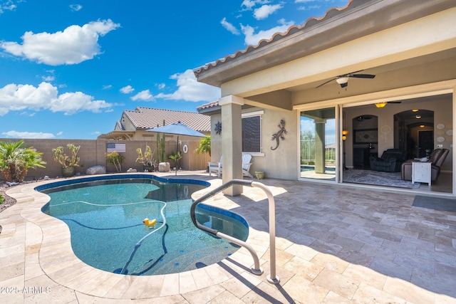 view of pool with a fenced backyard, a fenced in pool, and a patio
