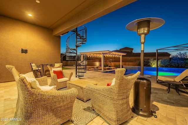 view of patio / terrace with stairway and an outdoor pool