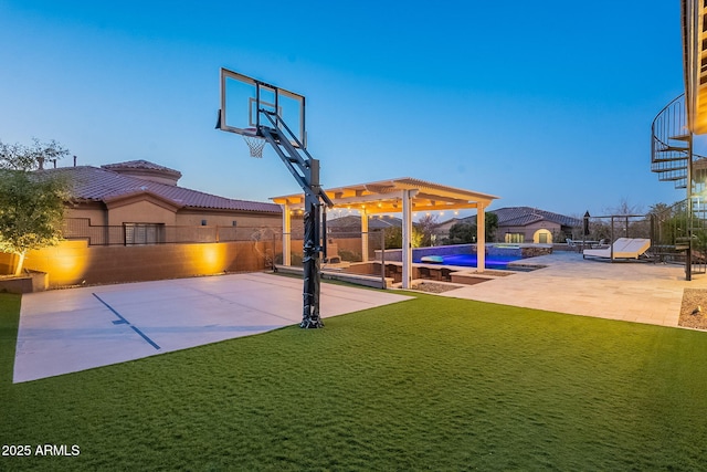 view of sport court featuring a fenced in pool, a lawn, fence, and basketball court