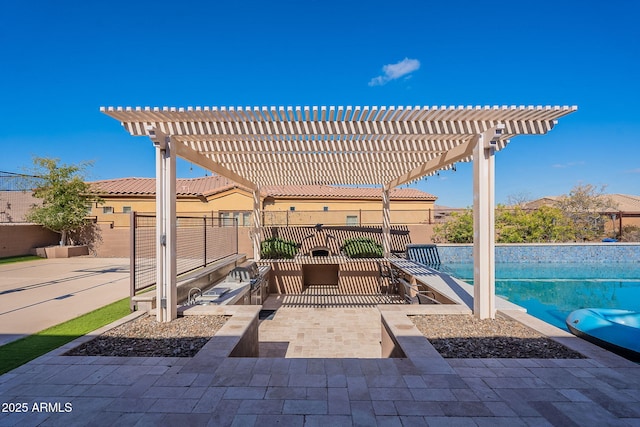 view of patio / terrace with a fenced in pool, fence, and a pergola