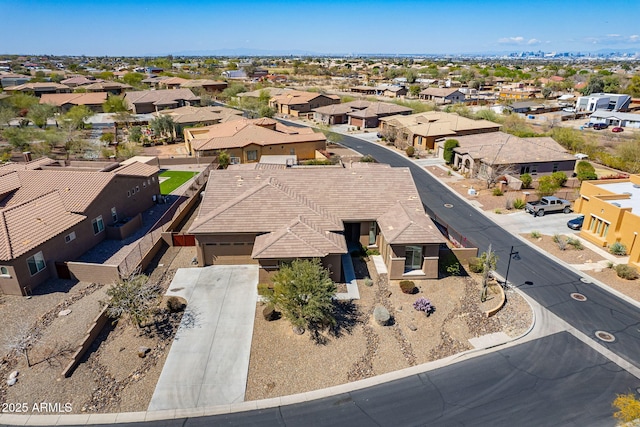 drone / aerial view with a residential view