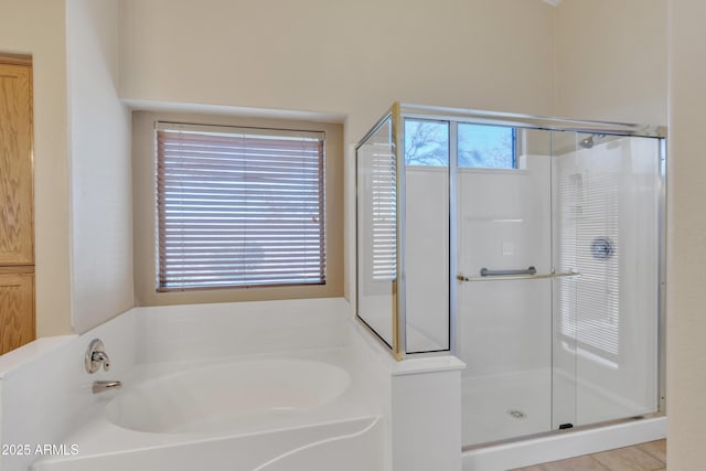 bathroom with independent shower and bath