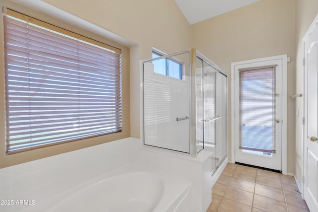 bathroom with plus walk in shower and tile patterned flooring