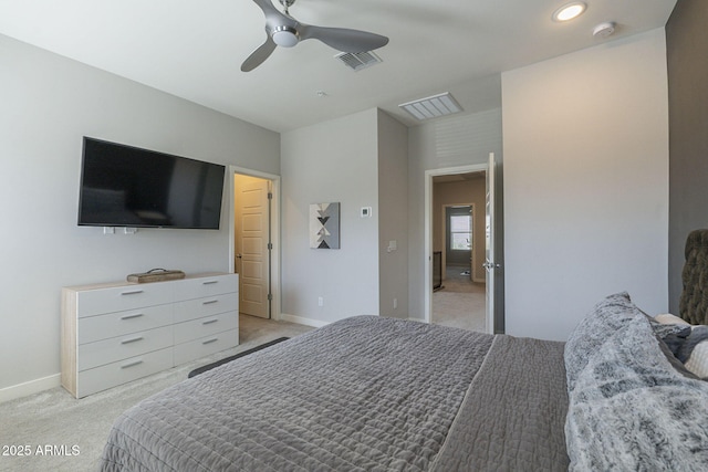 bedroom featuring ceiling fan and light colored carpet