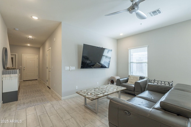 living room featuring ceiling fan