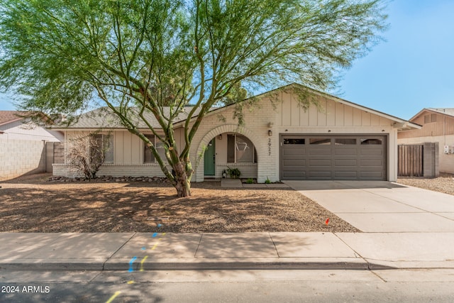 ranch-style home with a garage