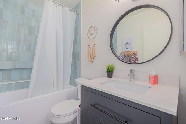 full bathroom with shower / bath combo, toilet, and vanity