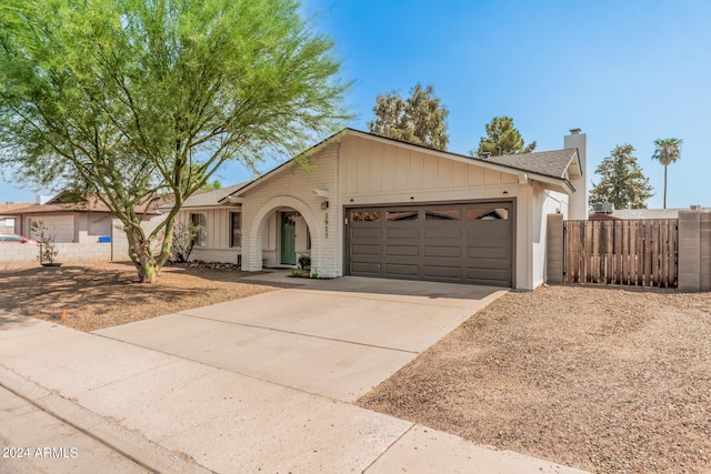 ranch-style home with a garage