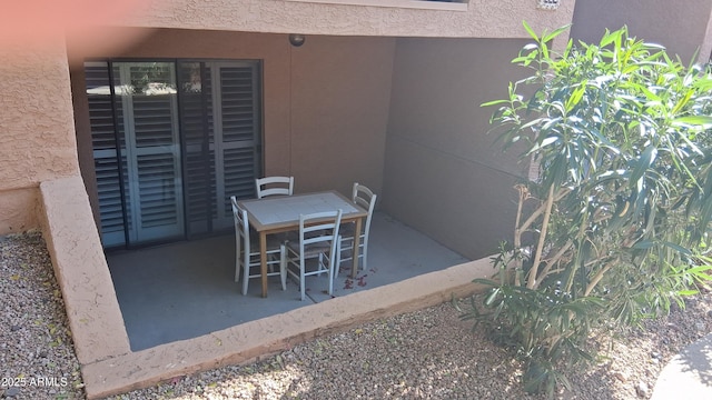 view of patio with outdoor dining space