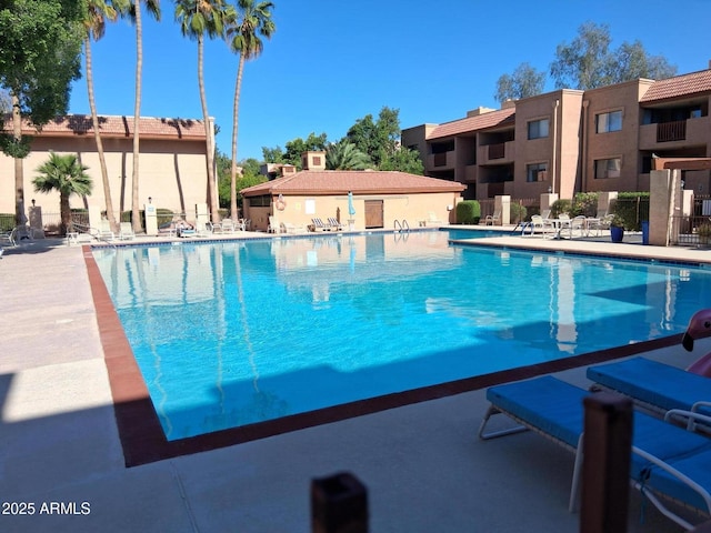 pool with a patio