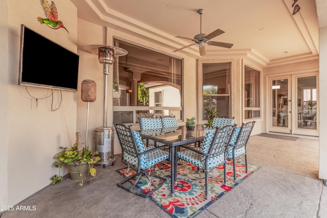 view of patio / terrace with outdoor dining space and a ceiling fan