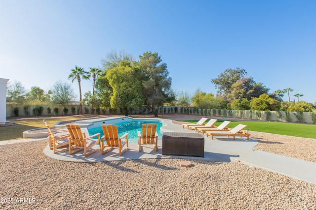 view of swimming pool featuring a patio