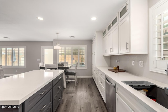 4142 E Sandy Way, Gilbert, AZ 85297 - kitchen with stainless steel dishwasher, white cabinetry, dark wood-style floors, light countertops, and recessed lighting