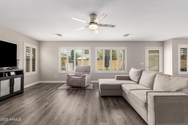 4142 E Sandy Way, Gilbert, AZ 85297 - living room with baseboards, wood finished floors, and a ceiling fan