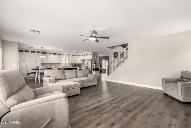 4142 E Sandy Way, Gilbert, AZ 85297 - living area with a ceiling fan, baseboards, dark wood-style floors, stairs, and recessed lighting