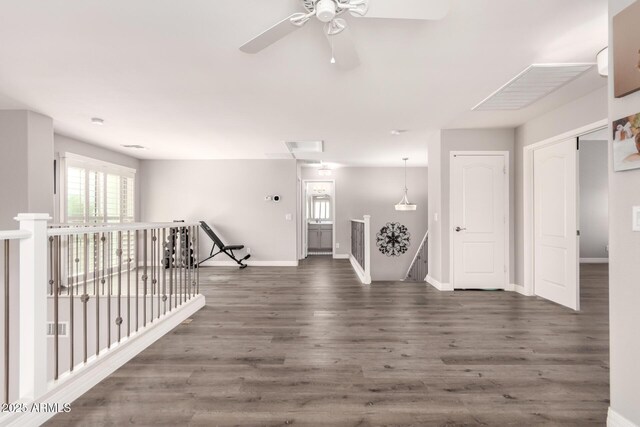 4142 E Sandy Way, Gilbert, AZ 85297 - empty room featuring baseboards, ceiling fan, and wood finished floors