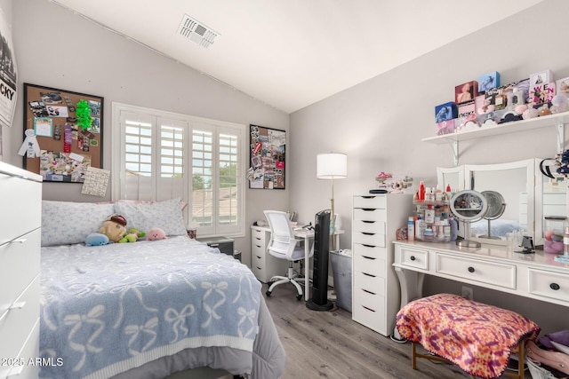 4142 E Sandy Way, Gilbert, AZ 85297 - bedroom featuring vaulted ceiling, wood finished floors, and a desk