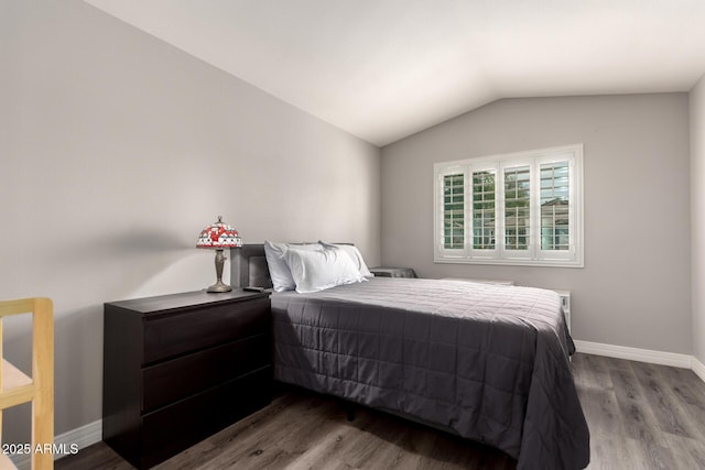 4142 E Sandy Way, Gilbert, AZ 85297 - bedroom featuring wood finished floors, vaulted ceiling, and baseboards