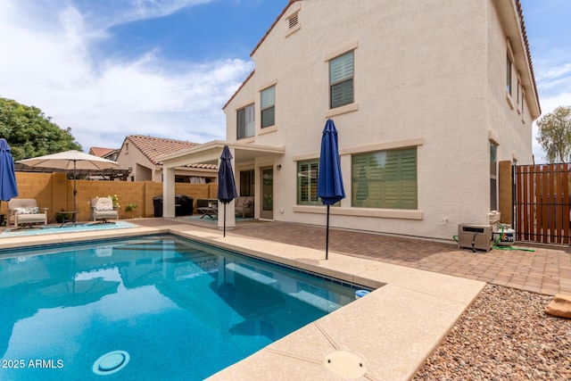 4142 E Sandy Way, Gilbert, AZ 85297 - rear view of house featuring a patio area, stucco siding, and a fenced backyard
