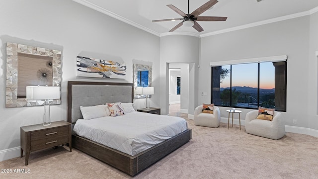 bedroom with crown molding, carpet floors, and ceiling fan