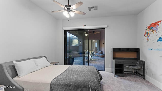 bedroom with access to exterior, ceiling fan, and carpet flooring