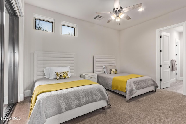 carpeted bedroom featuring ceiling fan