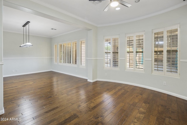 spare room with ornamental molding, ceiling fan, and dark hardwood / wood-style flooring