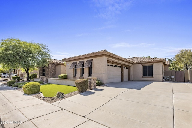 mediterranean / spanish-style house featuring a garage