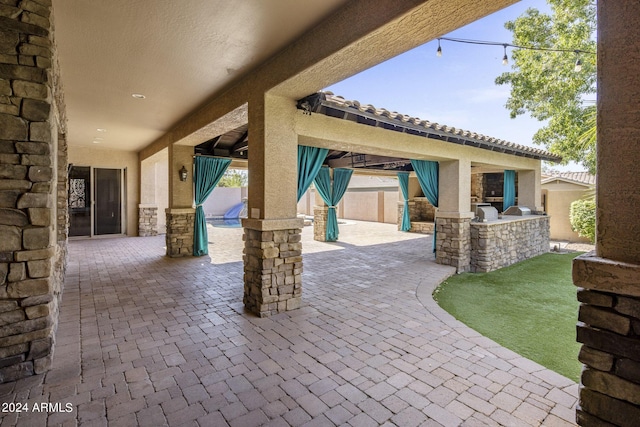 view of patio / terrace with area for grilling