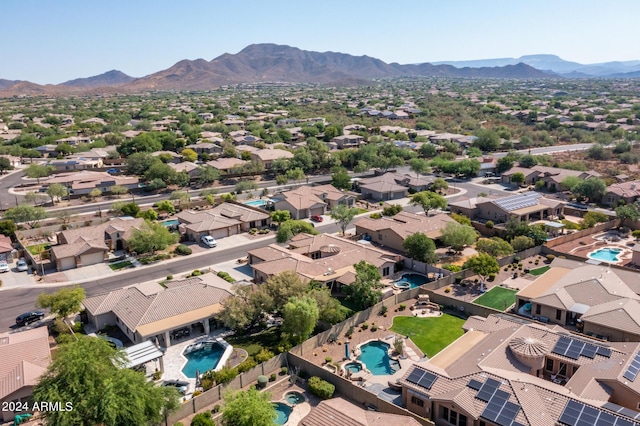 drone / aerial view featuring a mountain view