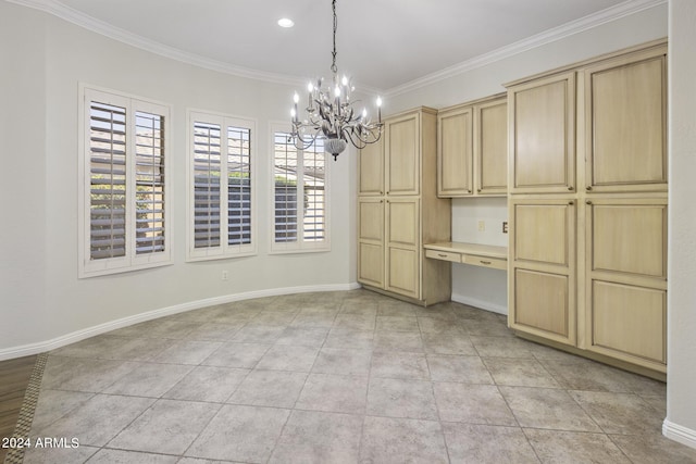 unfurnished dining area featuring crown molding, built in desk, an inviting chandelier, and light tile patterned floors