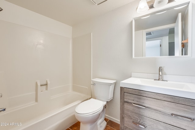 full bathroom featuring tile patterned flooring, vanity,  shower combination, and toilet