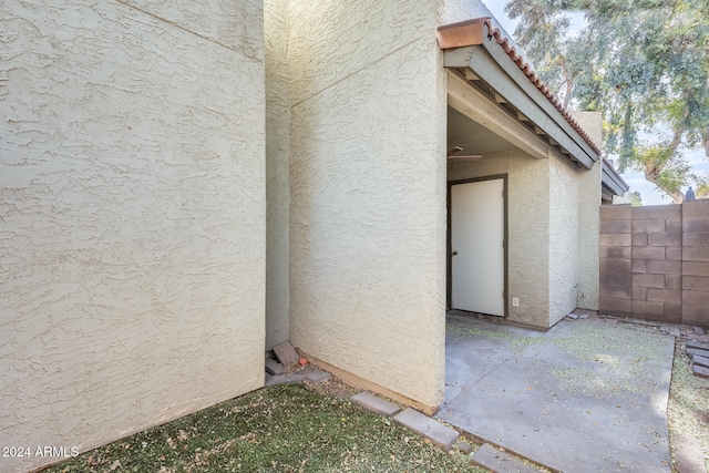 entrance to property with a patio area