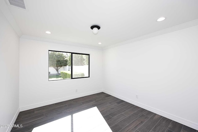 spare room featuring ornamental molding