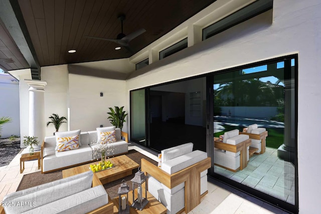 view of patio / terrace featuring ceiling fan and an outdoor living space