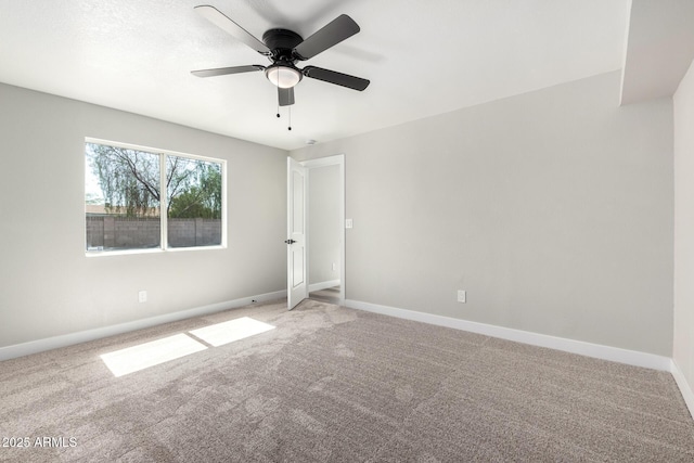 3249 E Nisbet Rd, Phoenix, AZ 85032 - empty room with light carpet, ceiling fan, and baseboards
