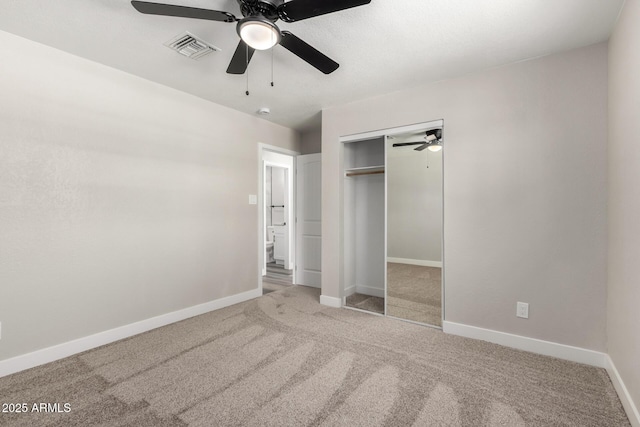 3249 E Nisbet Rd, Phoenix, AZ 85032 - unfurnished bedroom featuring visible vents, ceiling fan, carpet, baseboards, and a closet