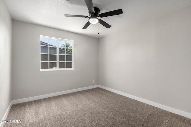 3249 E Nisbet Rd, Phoenix, AZ 85032 - carpeted spare room featuring baseboards and a ceiling fan